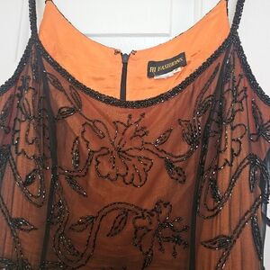HI FASHIONS Dress, size 10 with two colors, black and orange.